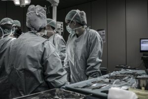 A surgical team provides care for a patient